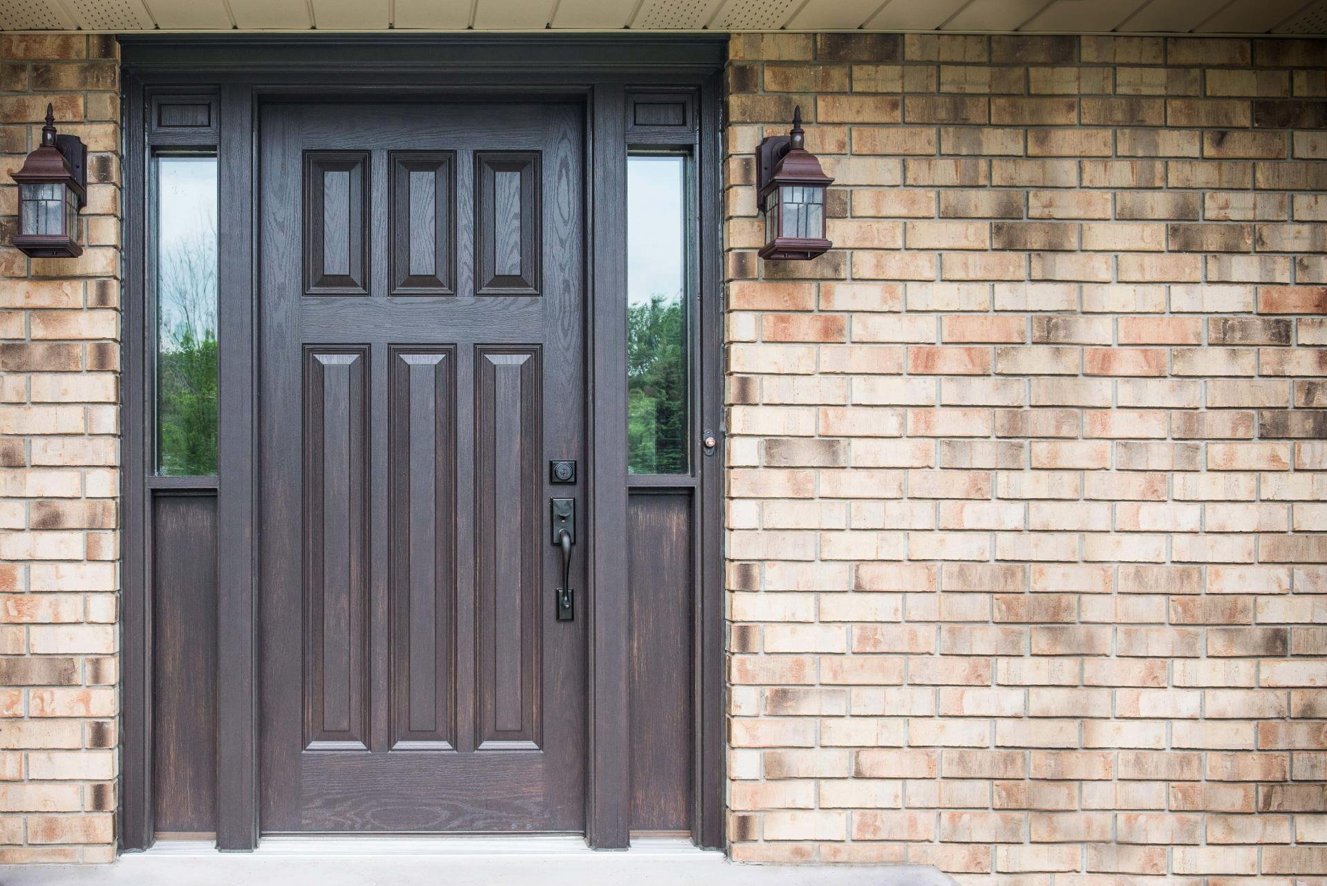 Older Style Country Home With Custom Made Door Entry System Painted Black