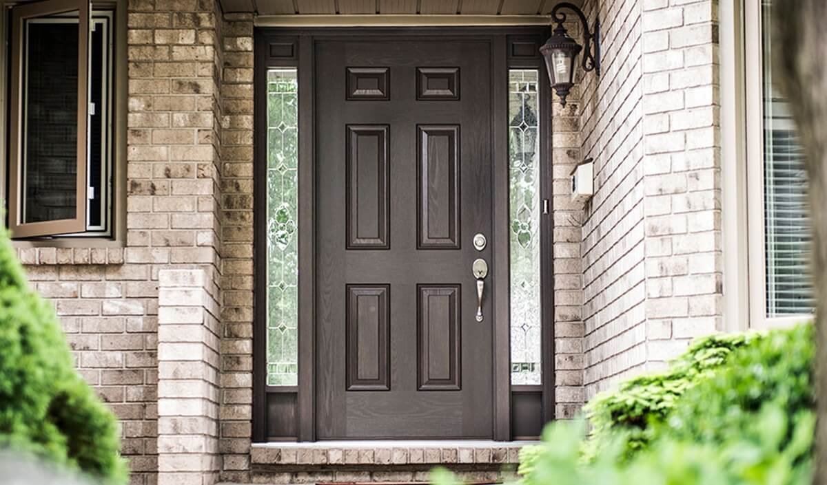 Close Up of Mahogany Fiberglass Entry Door System Custom Made for Front Porch Of Home