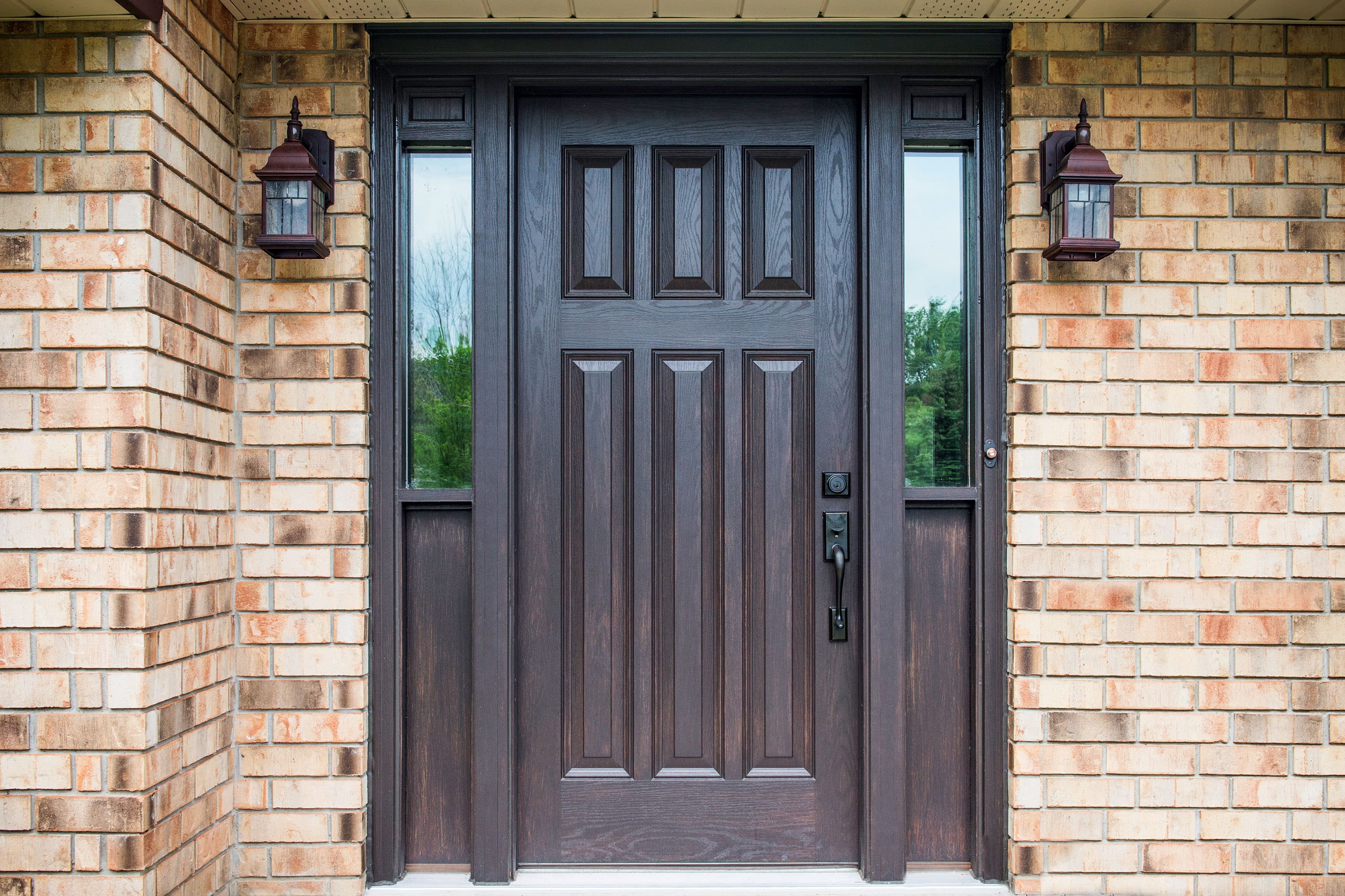 Close Up of Entry Way of Home Showcasing New Custom Made Fiberglass Entry Door