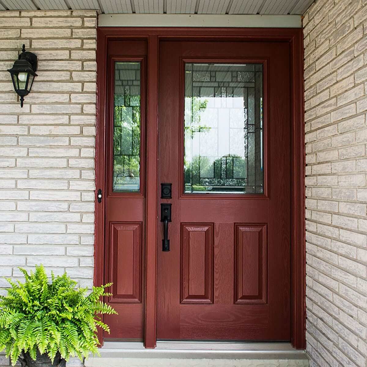 Close Up of Entry Way of Home Showcasing New Custom Made Fiberglass Entry Door