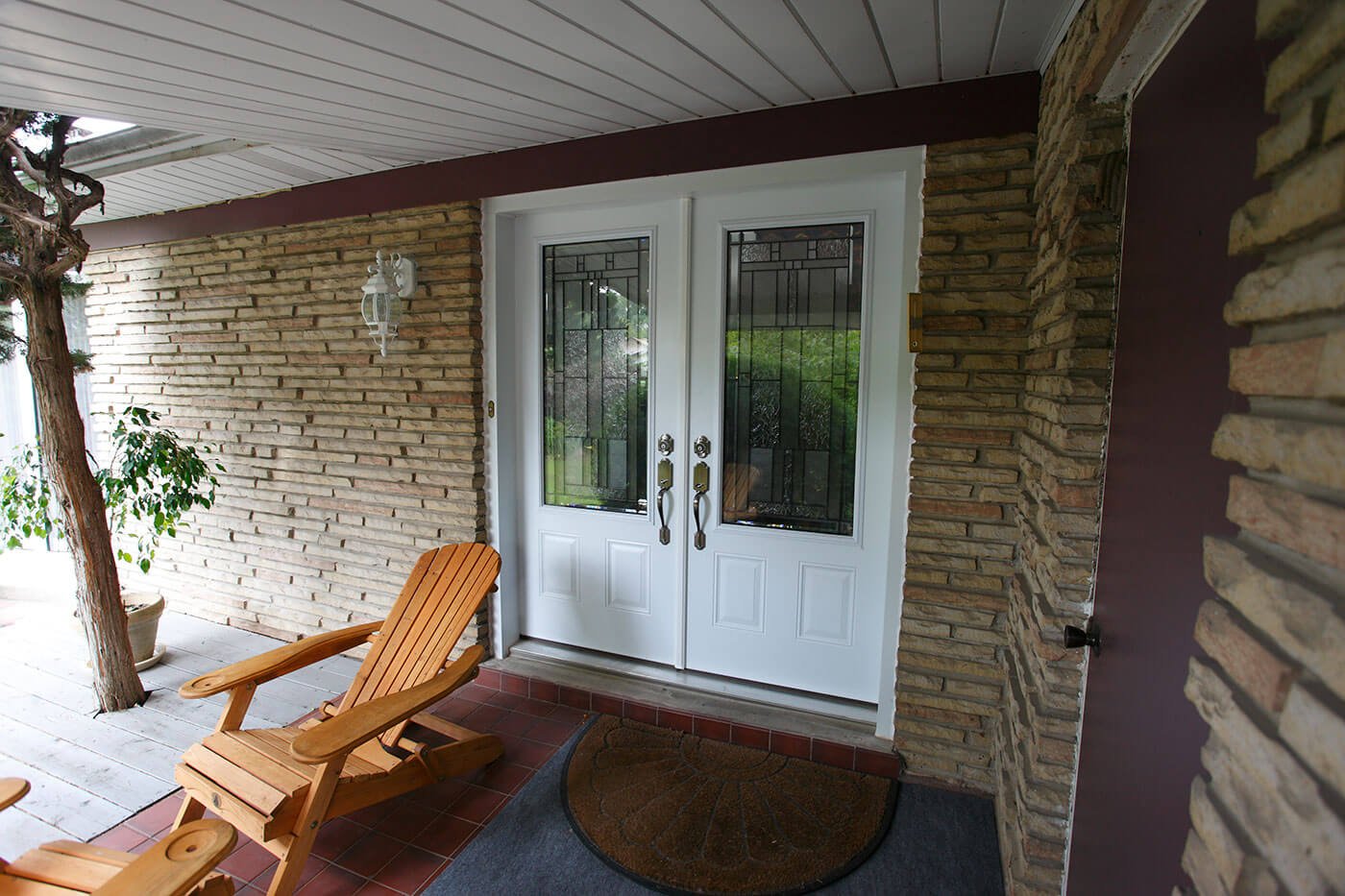 Front Porch of Modern Home With New Custom Made Steel Entry Door Double Door System